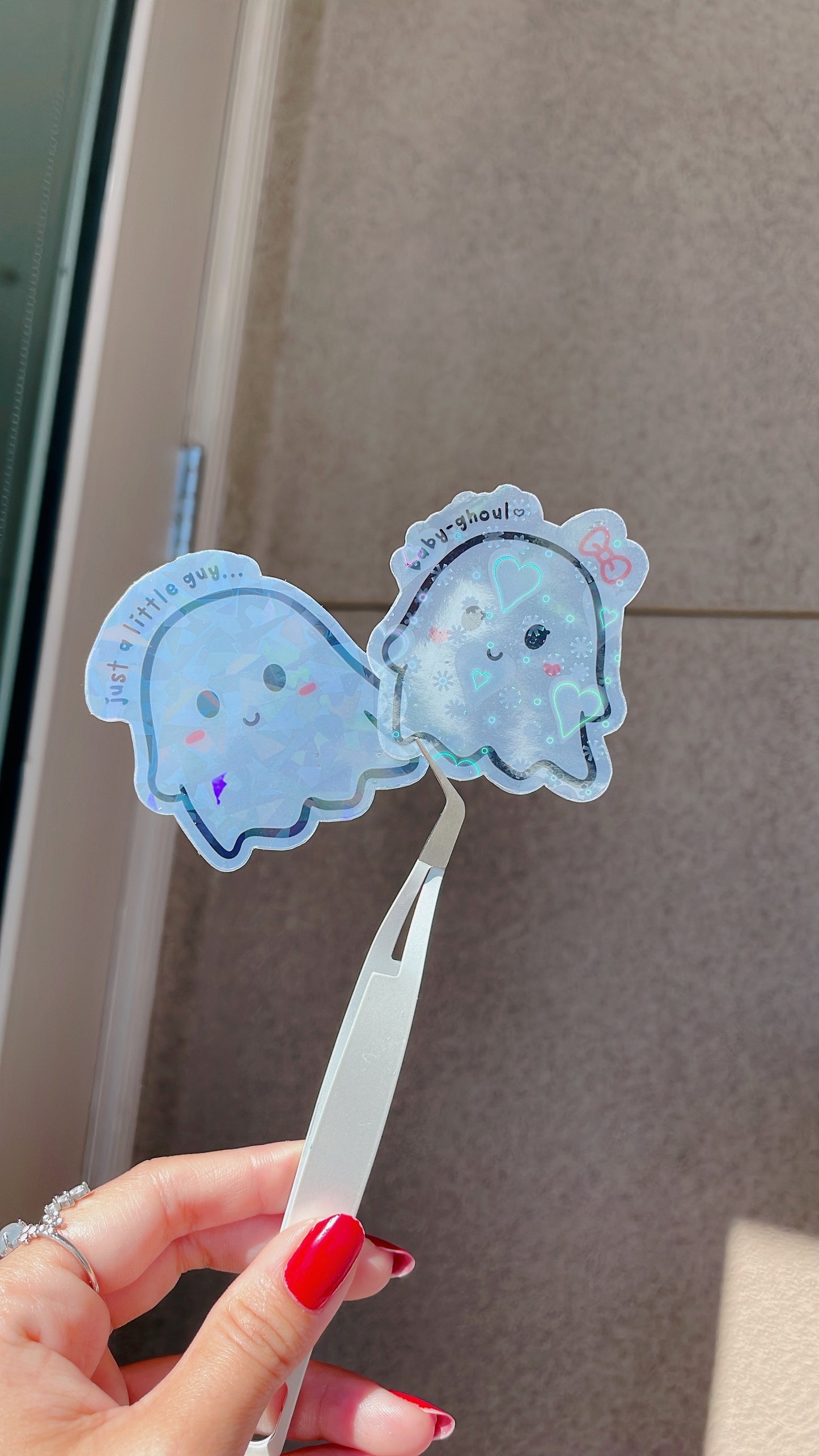 Little guy and his baby ghoul sticker