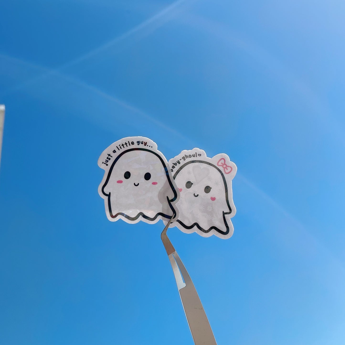 Little guy and his baby ghoul sticker