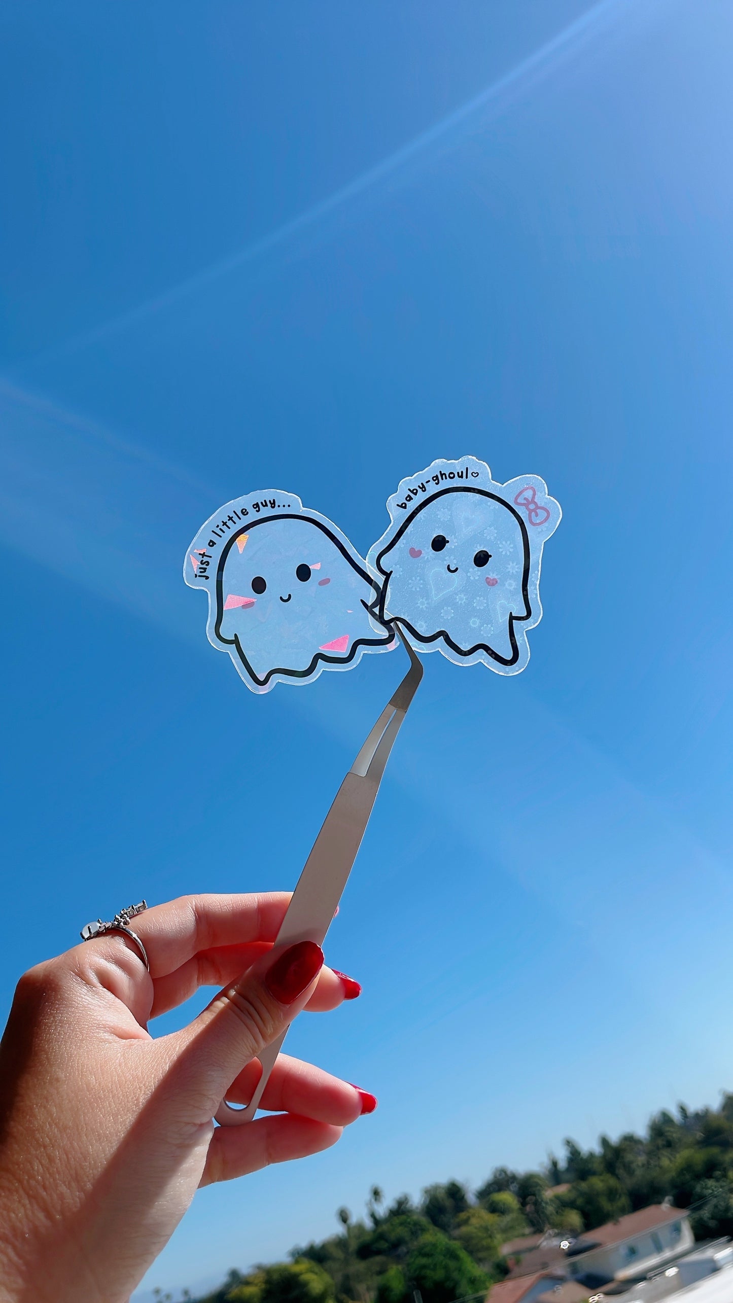 Little guy and his baby ghoul sticker